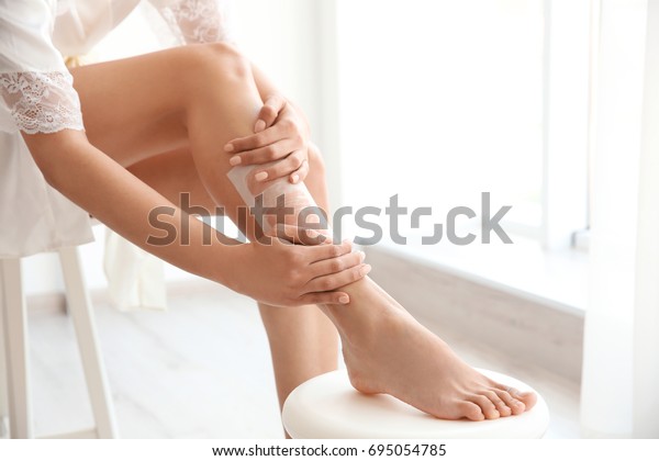 Beautiful Young Woman Removing Hair Wax Stock Photo Edit Now