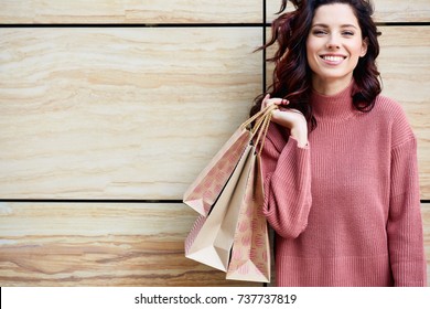 Beautiful Young Woman With Shopping Bags