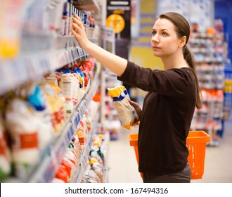 Beautiful Young Woman Shopping For Cereal, Bulk In A Grocery Supermarket