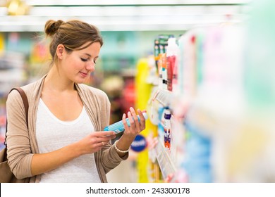 Beautiful Young Woman Shopping In A Grocery Store/supermarket (color Toned Image)