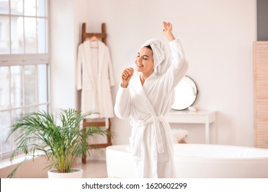 Beautiful Young Woman Singing In Bathroom