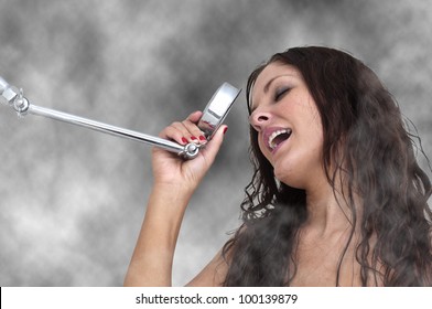 A Beautiful Young Woman Singing In The Shower