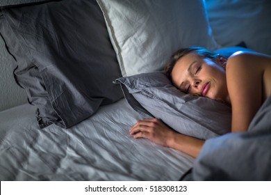 beautiful-young-woman-sleeping-bed-260nw