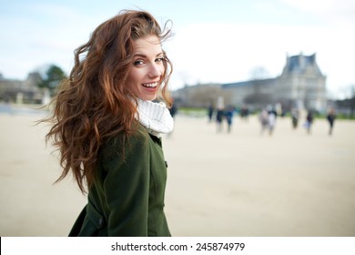 Beautiful Young Woman Smiling. Walking In The City