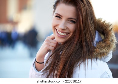 Beautiful Young Woman Smiling In Winter Time