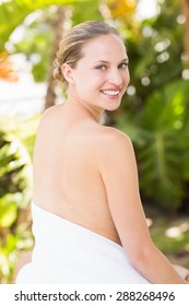 Beautiful young woman at spa center - Shutterstock ID 288268496