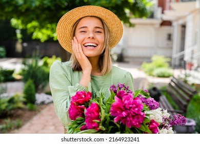 Beautiful Young Woman In Summer Style Outfit Smiling Happy Walking With Flowers In City Street Wearing Straw Hat Fashion Trend, Peony, White Teeth Candid