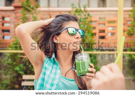 Image, Stock Photo Woman with sunglasses drinking green vegetable smoothie outdoors