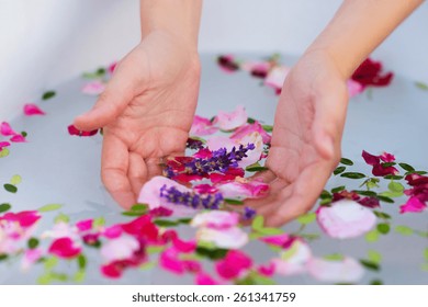 Beautiful Young Woman Taking A Herbal Bath.