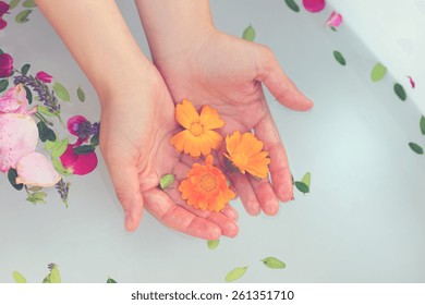 Beautiful Young Woman Taking A Herbal Bath.