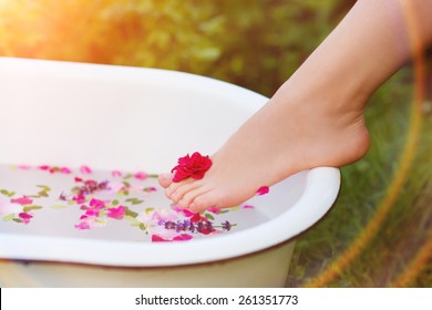 Beautiful Young Woman Taking A Herbal Bath.