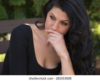 Beautiful young woman thinking and worry about something - Shutterstock ID 283353008