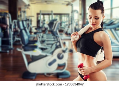 Beautiful Young Woman Training At Gym