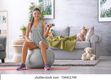 Beautiful Young Woman Training At Home