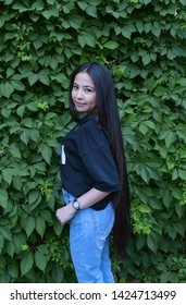 beautiful young woman from Uzbekistan with very long black hair