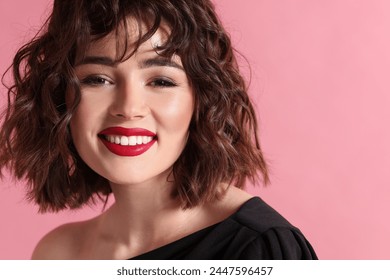 Beautiful young woman with wavy hairstyle on pink background. Space for text - Powered by Shutterstock