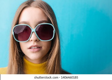 Beautiful Young Woman Wearing Big Sunglasses.