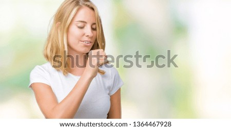 Beautiful young woman wearing casual white t-shirt over isolated background feeling unwell and coughing as symptom for cold or bronchitis. Healthcare concept.