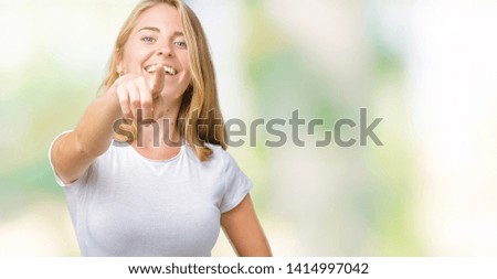 Beautiful young woman wearing casual white t-shirt over isolated background Laughing of you, pointing to the camera with finger hand over chest, shame expression