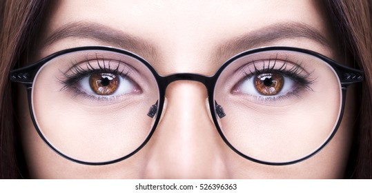 Beautiful Young Woman Wearing Glasses. Close-up Shot