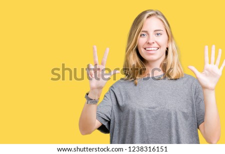 Similar – Pretty woman with OKAY sign, ok gesture. Happy lady, correct choice, yellow wall