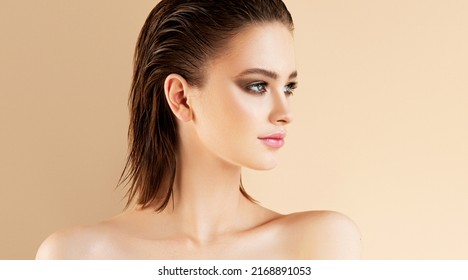 Beautiful young Woman  with wet hair effect  and clean fresh skin  .Girl  beauty face care. Facial  treatment   . - Shutterstock ID 2168891053