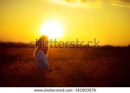 Similar – Sonnenuntergang, Rückenansicht Frau, Feld