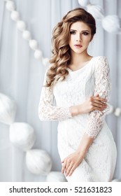 Beautiful Young Woman In White Dress