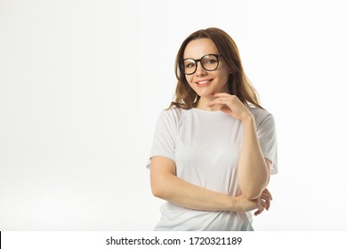 Beautiful Young Woman In A White T-shirt On A White Background