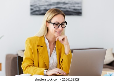 Beautiful young woman working using computer laptop concentrated and smiling sitting in modern or home office, online remote work, smiling