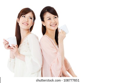 Beautiful Young Women Drinking Coffee. Portrait Of Asian.