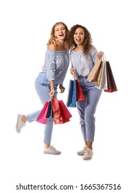Beautiful Young Women With Shopping Bags On White Background