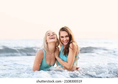 Beautiful Young Women Swimming In Sea