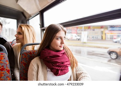 Beautiful young women traveling by bus, having fun - Powered by Shutterstock