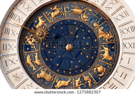 Beautiful zodiac clock at the Piazza San Marco (St. Marks Square) in Venice, Italy. The clock has been isolated on white background.