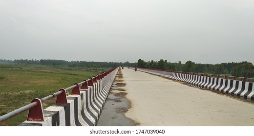 Beautifull Indian River Bridge, Cloudy Sky, People Riding In Bridge- Image