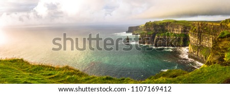 Beautifull wild landscape of Cliffs of Moher in Ireland. Hiking trip on summer holidays.