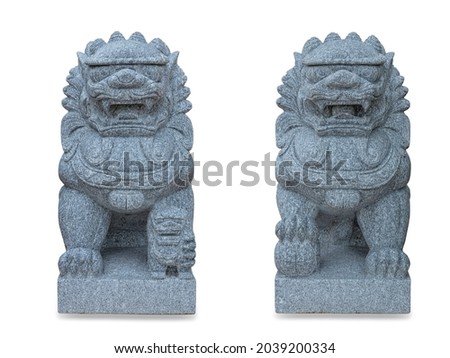 The beautifully carved stone lions in front of Temple