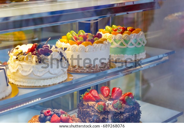 Beautifully Decorated Cakes On Display Bakery Stock Photo Edit