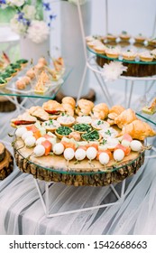 Beautifully Decorated Catering Banquet Table With Different Food Snacks And Appetizers On Corporate Party Event Or Wedding Celebration Outdoors