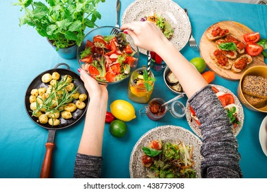 Beautifully Decorated Table With Delicious Food From An Aerial View