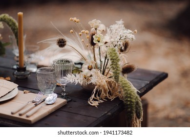 A beautifully designed wedding table in the forest