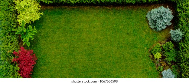 Beautifully Landscaped Small Patio Garden Top View With No People And Empty Space. 