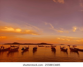 A beautifully serene view of a stunning sunset with fishing boats - Powered by Shutterstock