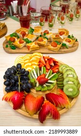 Beautifully Sliced Fruit, A Snack Of Sliced Fresh Ripe Fruit On A Wooden Round Tray