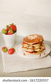 A beautifully styled stack of pancakes presented with elegant food styling.