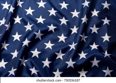 Beautifully Waving Stars Of American Flag Close Up Background.