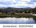 Beautifully wild and scenic Beartooth Lake along the  Beartooth Highway in Rocky Mountains between Cooke City and Red Lodge, Montana, in June, 2021