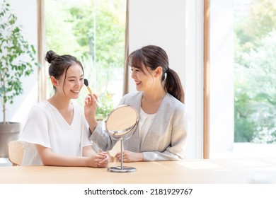 Beauty Advisor And Young Woman