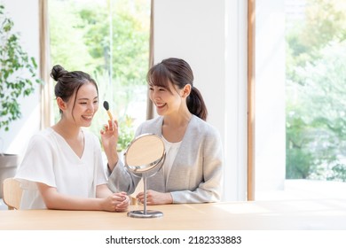 Beauty Advisor And Young Woman